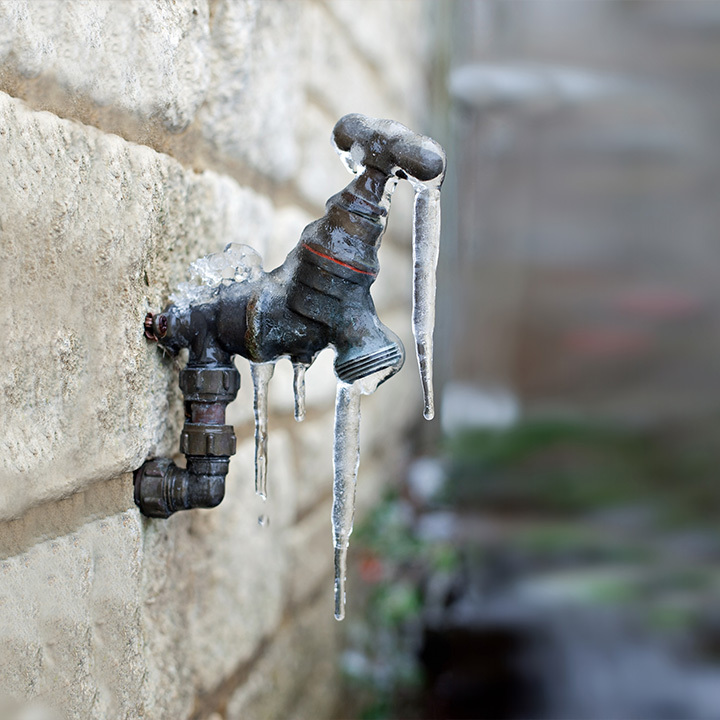 Image of and outside tap with ice on it